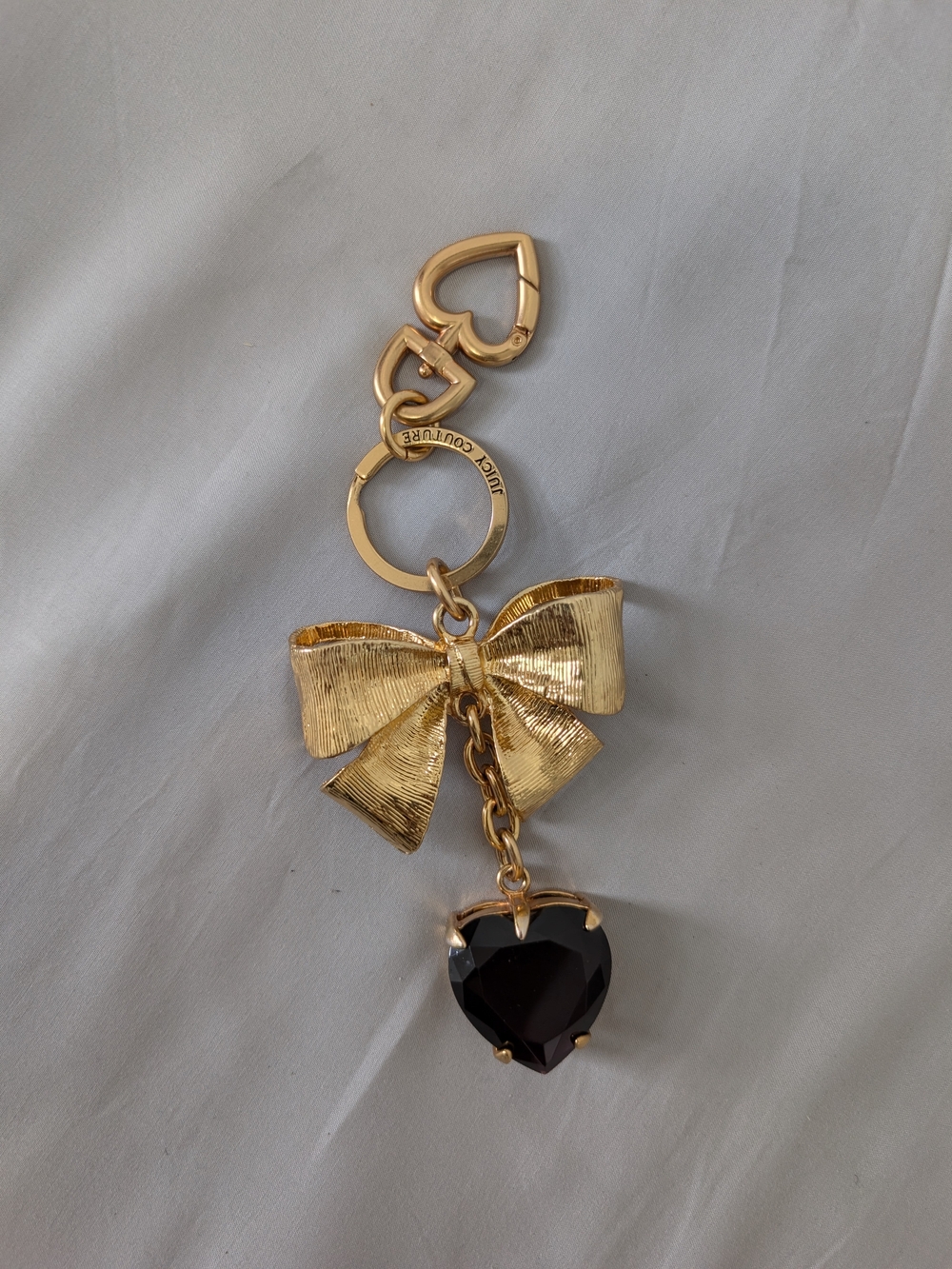Juicy Couture Gold Bow Keychain with Black Heart Charm
